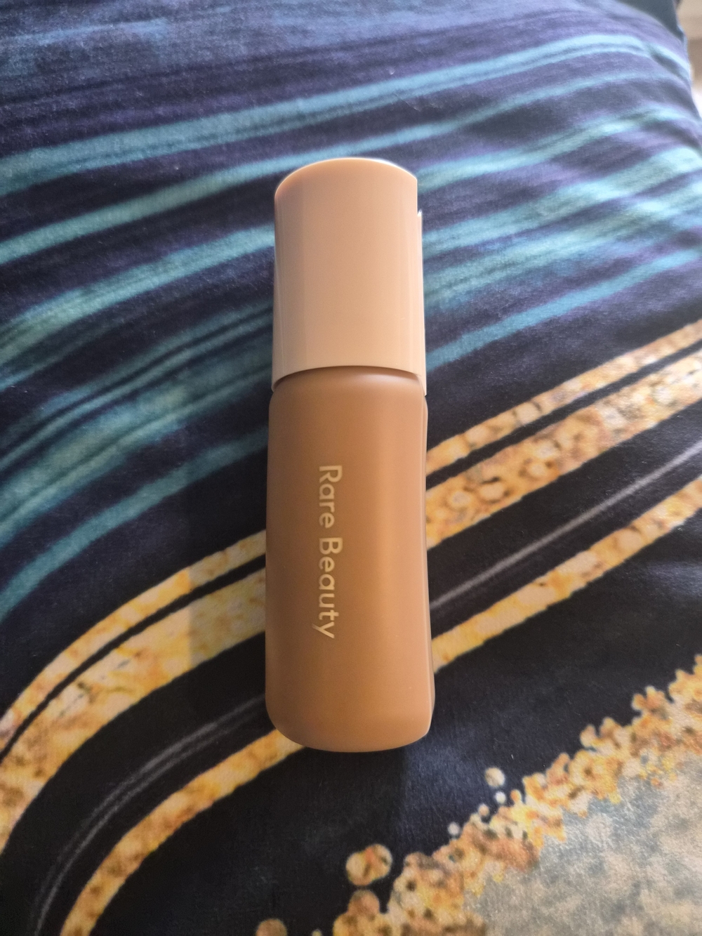 Rare Beauty Foundation Bottle — Warm Tan / Beige
